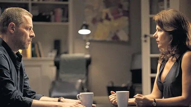 A third picture of Sidse Babette Knudsen and Mikael Birkkjær as Birgitte Nyborg and Philip Christiansen, in Borgen