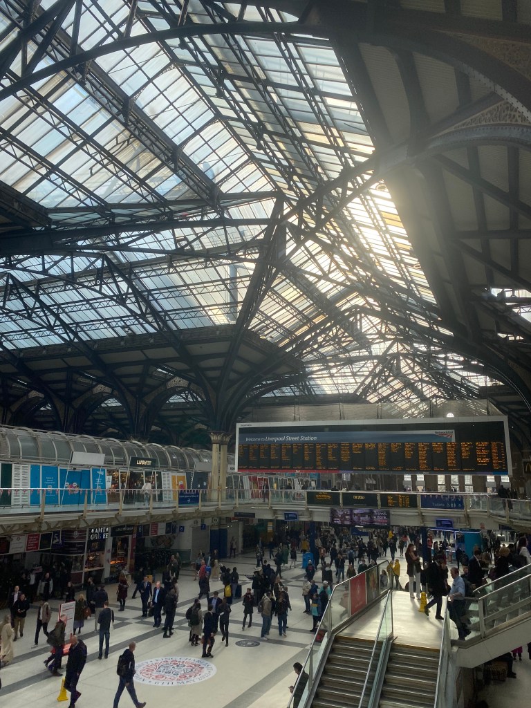 Liverpool Street station, with light streaming onto the concourse